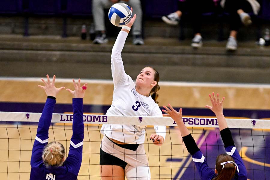 Lipscomb Volleyball Player Spiking Ball